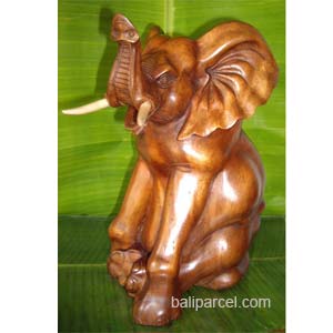 Wooden Sitting Elephant, Hand Carved From Suar Wood