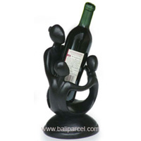 Abstract Wine Bottle Holder With Black Color, Hand Carved From Suar Wood