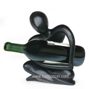 Abstract Wine Bottle Holder With Black Color, Hand Carved From Suar Wood