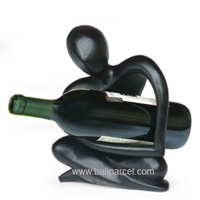 Abstract Wine Bottle Holder With Black Color, Hand Carved From Suar Wood