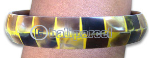 Wooden Bracelet From Albesia Wood With Coconut Inlaid With Resin.