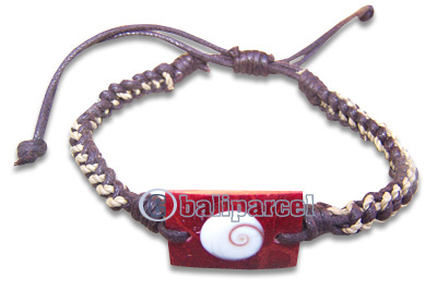 Bracelet, Cotton String With Red Coral Inlaid With Shiva Eye.