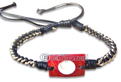 Bracelet, Cotton String With Red Coral Inlaid With Shiva Eye.