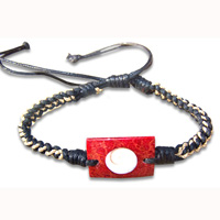 Bracelet, Cotton String With Red Coral Inlaid With Shiva Eye.