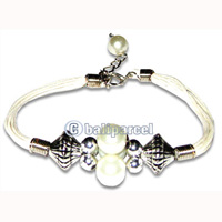 Bracelet, Handmade From Cotton String And Glasbead.