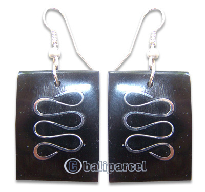 Earring, Handmade From Resin Inlaid With Metal.
