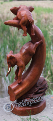 Wooden Elephant On Horn, Hand Carved From Suar Wood