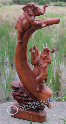 Wooden Elephant On Horn, Hand Carved From Suar Wood