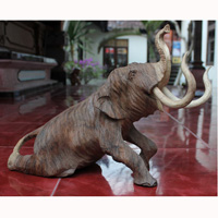 Wooden Sitting Elephant, Hand Carved From Suar Wood