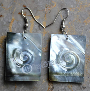 Earring, Made From Shell With Carving