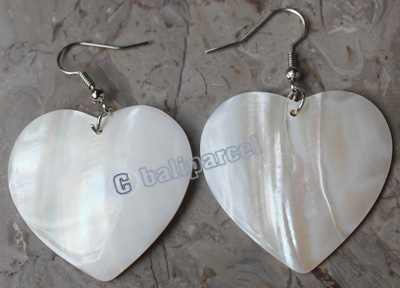 Earring, Made From Shell With Carving