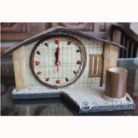 Clock Made From Natural Material, Like Coconut Shell, Bamboo, And Sand