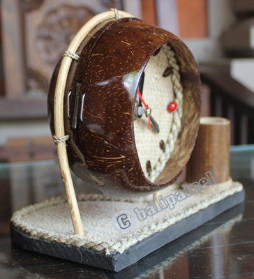 Clock Made From Natural Material, Like Coconut Shell, Bamboo, And Sand