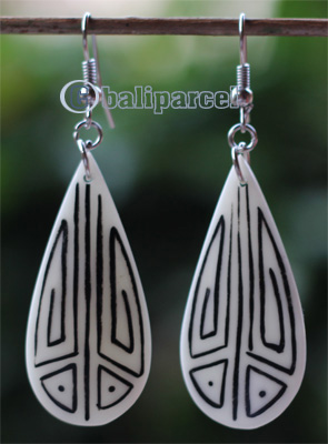Earring Bone Carving With Tatto