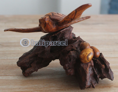 Handcarved Wooden Turtle On Natural Wood