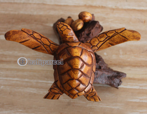 Handcarved Wooden Turtle On Natural Wood