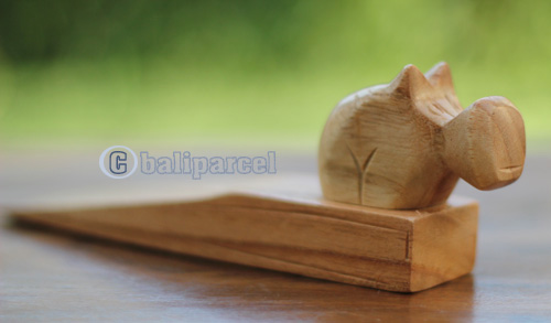 Wooden Door Stop With Rhinocerous Carving, This Pieces Hand Carved From Hibiscus Wood 