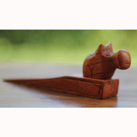 Wooden Door Stop With Rhinocerous Carving, This Pieces Hand Carved From Hibiscus Wood 