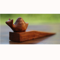 Wooden Door Stop With Snail Carving, This Pieces Hand Carved From Hibiscus Wood 