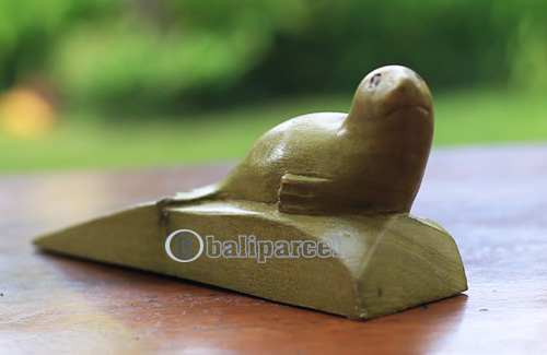 Wooden Door Stop With Sea Dog Carving, Made From Waru Wood