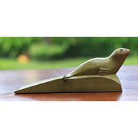 Wooden Door Stop With Sea Dog Carving, Made From Waru Wood